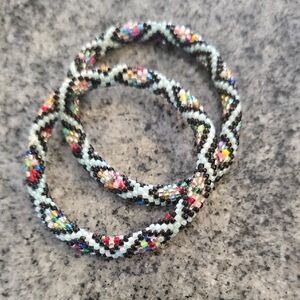 Colorful Beaded Bracelets. Wrist. Roll On Rol